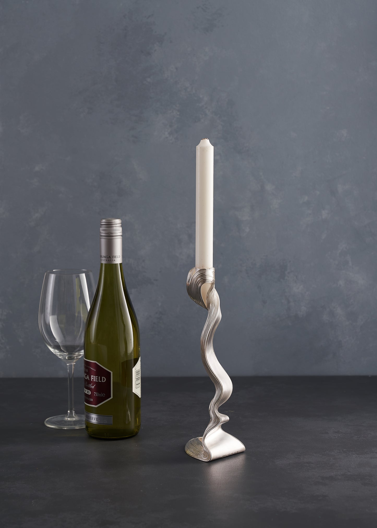 Un Silver Candlestick